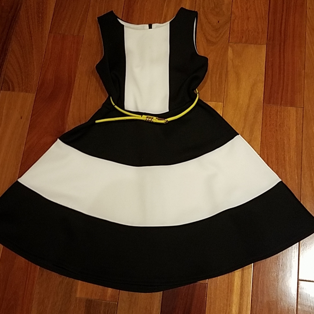 White and black dress with yellow belt
